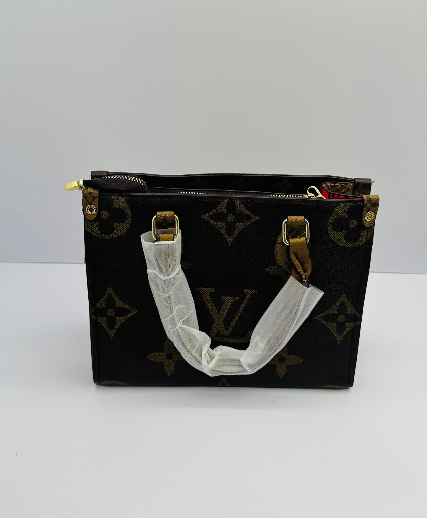 Luxury inspired On-The-Go Tote with Charm handbag